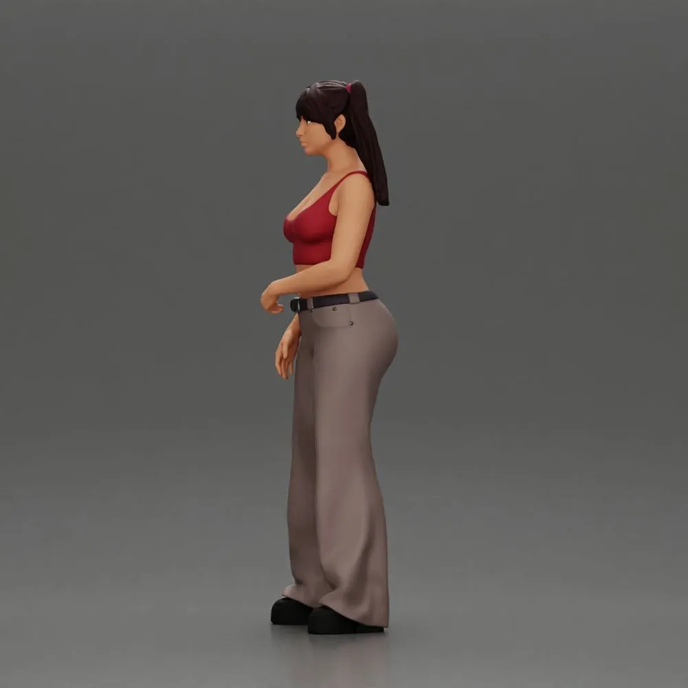 Chola girl with pigtails standing in flared pants