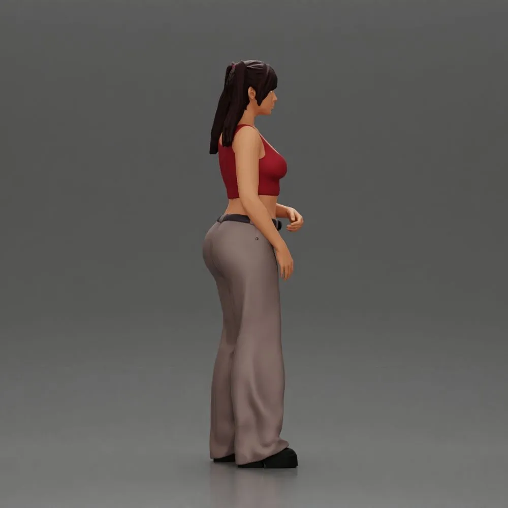 Chola girl with pigtails standing in flared pants