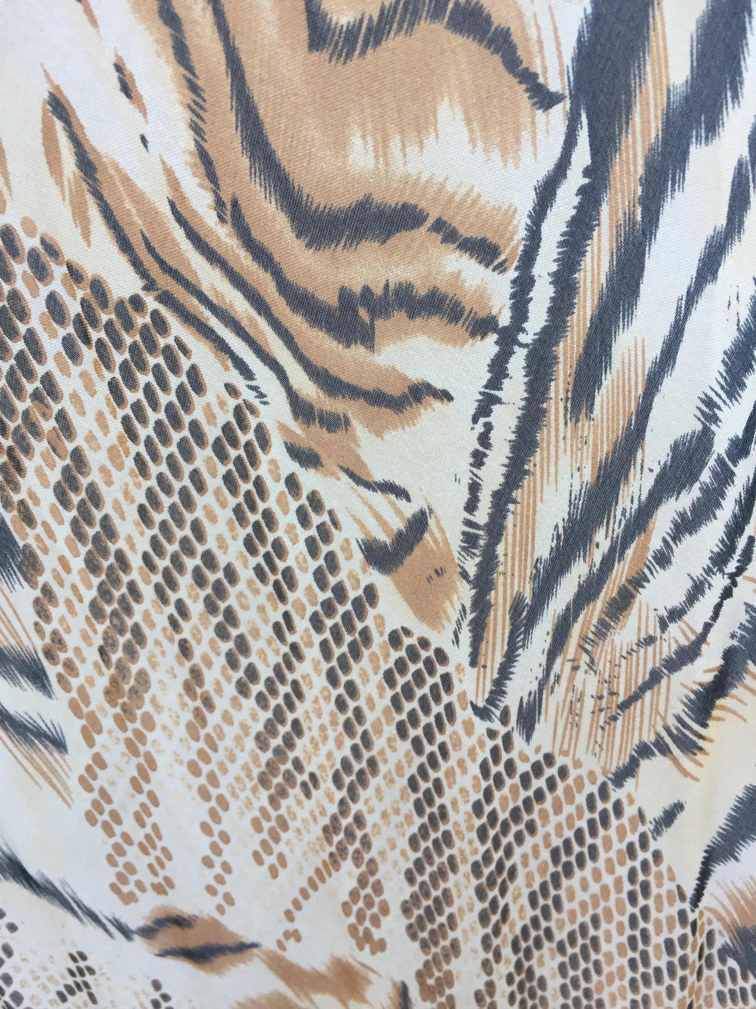 SL08 Mixed print with tiger stripes and reptile scales.